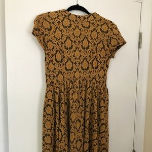 Mustard yellow dress.